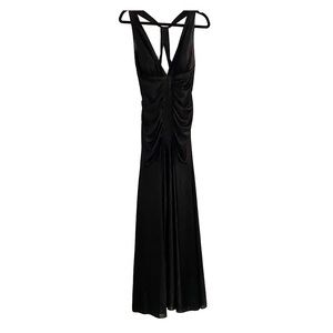 Black deep flowing gown with open back.